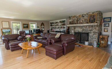 The living room, with built-in...