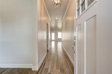Hallway featuring hardwood / wood-style flooring, 