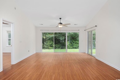 Empty room with light wood-type flooring, ceiling 