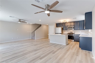 Kitchen with appliances with stainless steel finis