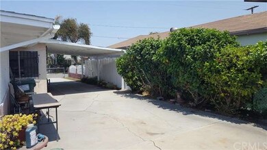 View thru carport from rear driveway.  Room for se