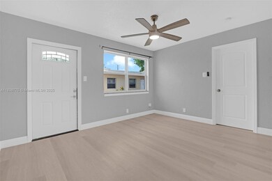 369 Phippen Waiters Rd unit 2, Dania, FL 33004 - photo 2