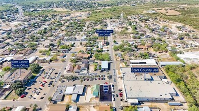 Aerial view of property and surrounding area