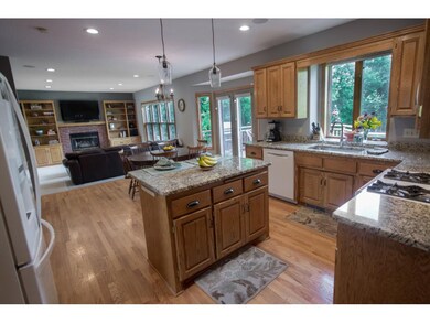 The kitchen features more of the homes refinished 