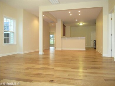 Dining Room. SIMILAR PHOTO - View from Living Room into Dining Room and Kitchen