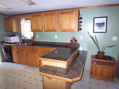 Kitchen is very spacious (26'x13').