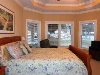 Master Bedroom suiet has a double tray ceiling wit