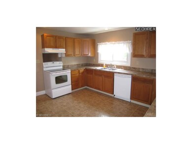 Nice kitchen with oven, range and dishwasher.