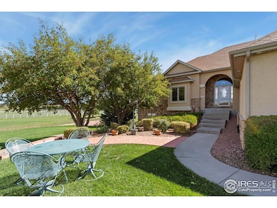 39230 Longs Peak Ct, Severance, CO 80610 - photo 2