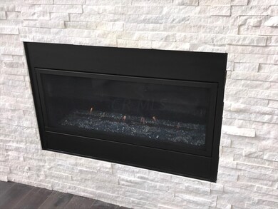 GAS FIREPLACE RAISED HEARTH