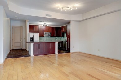 The kitchen opens up directly to the living room,