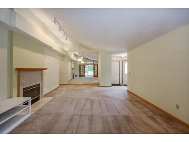 Partially vaulted living room and informal dining 