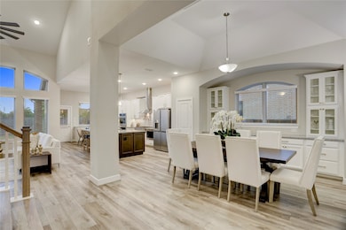 The open-concept layout beautifully connects the f