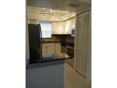 Kitchen. Pass through counter from kitchen to dini