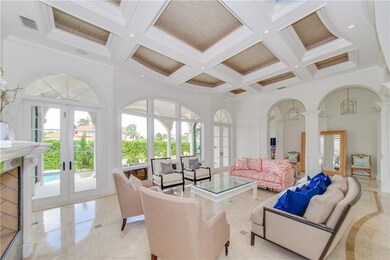 Floor to Ceiling Windows Fill this Room with Natur