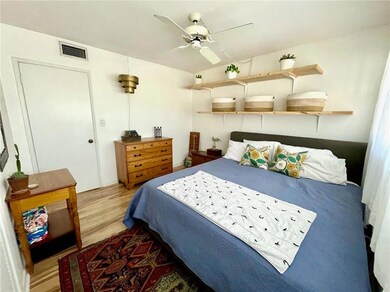 Overhead ceiling fan in bedroom