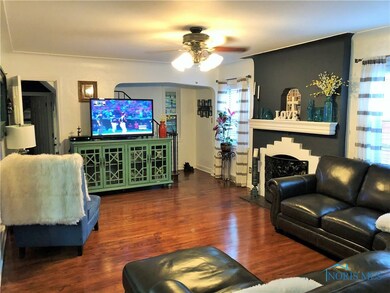 Living Room - Gleaming Hardwood Floors and Firepla