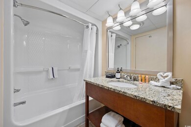 Full bathroom featuring shower / bathtub combinati