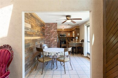 Dining area with farmhouse wood wall and yes more 