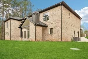 Left rear of 4 sides brick home