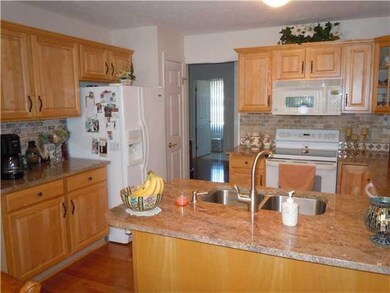 Kitchen Lots of maple cabinets