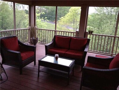 Patio/Deck. Awesome covered screened in deck off of the kitchen.  access also through the mud room.