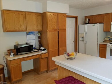 A close up of the desk area and lots of counter sp