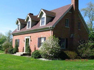 Side view of the home lots of landscapin