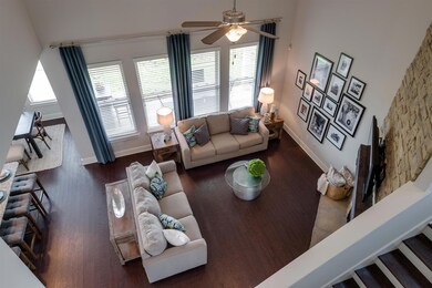 NOT Actual Home but same beautiful floorplan!  Dramatic two story family room