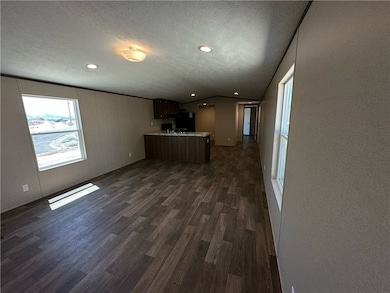 Open concept living room and kitchen area
