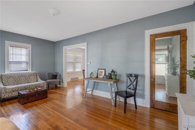 The living room is quite spacious and bright with