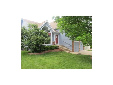 Front elevation w/ beautiful landscaping