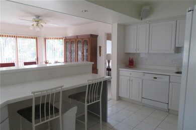 Spacious Kitchen with Breakfast Bar and Trey Ceili