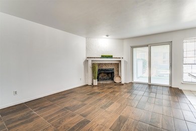 Living room facing the fireplace.