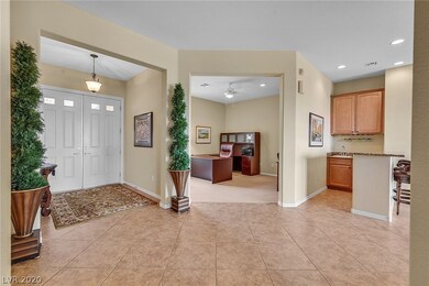 Entryway with neutral paint and tile flooring.