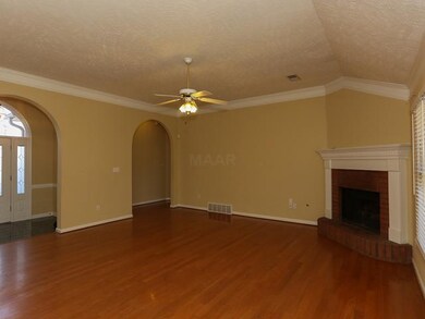 Another view of Great Room showing entry and arche