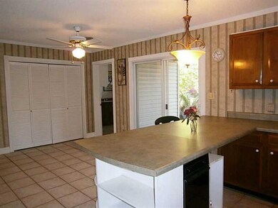 Breakfast Room. Kitchen opens to bright centrally