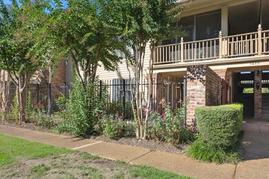 The brick column and iron fence affords views of t