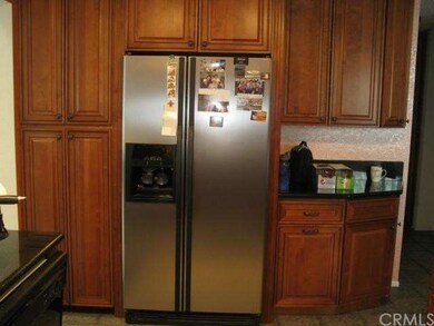 Refrigerator and custom cabinets