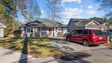 View of front of house featuring roof with shingle
