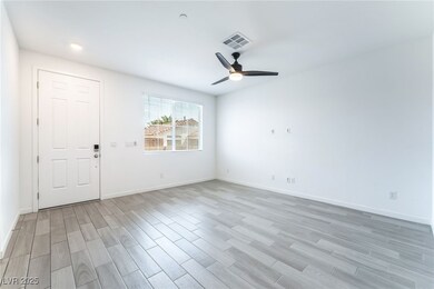Empty room featuring light wood-style floors and a