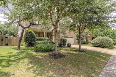 Obstructed view of property featuring brick sidin