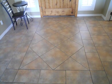 Welcome Your Guests into Tiled Foyer