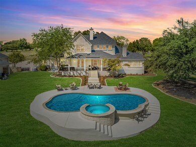 This AMAZING ESTATE is perfectly positioned on a private 1.53 acre lot located in the desirable Estates of Westlake.