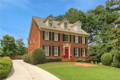View of front of house with brick siding