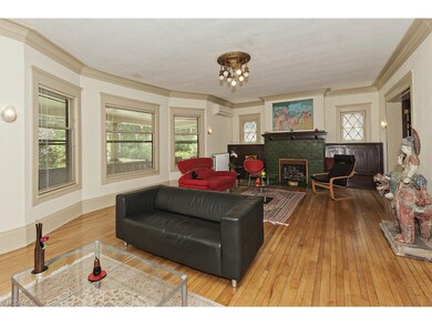 Living Room Also Features Bay Window Overlooking Front Porch