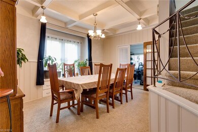 Dining room with stunning coffered ceiling...