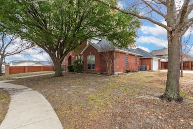 View of side of property featuring a garage and ce