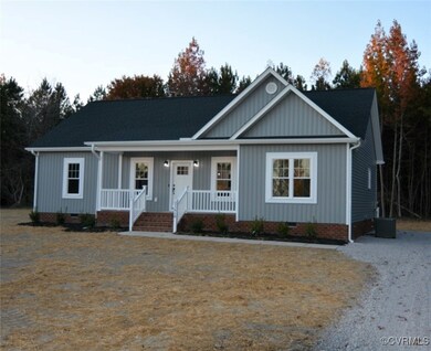 Ranch-style home featuring covered porch