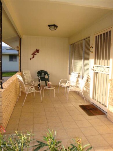 NICE TILED FRONT PATIO